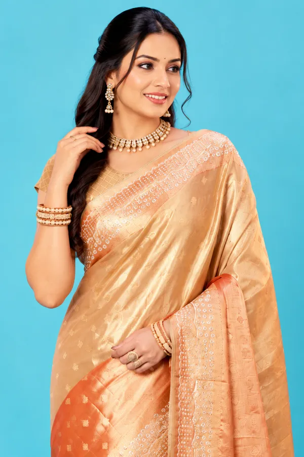 Elegant_Golden_Peach_Designer_Saree_With_Delicate_Zari_Woven_Motifs_Rich_Traditional_Pallu_Orange