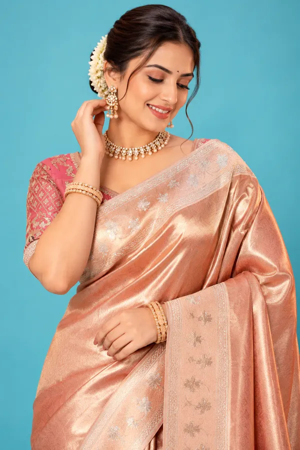 Elegant_Rose_Gold_Peach_Designer_Saree_With_Delicate_Floral_Zari_Work_Rich_Traditional_Pallu_Rose_Gold