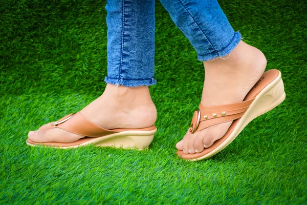 Tan_Synthetic_Leather_Stud_Accent_Wedge_Flip_Flops_For_Women