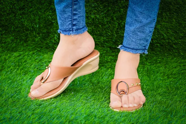 Tan_Synthetic_Leather_Stud_Accent_Wedge_Flip_Flops_For_Women
