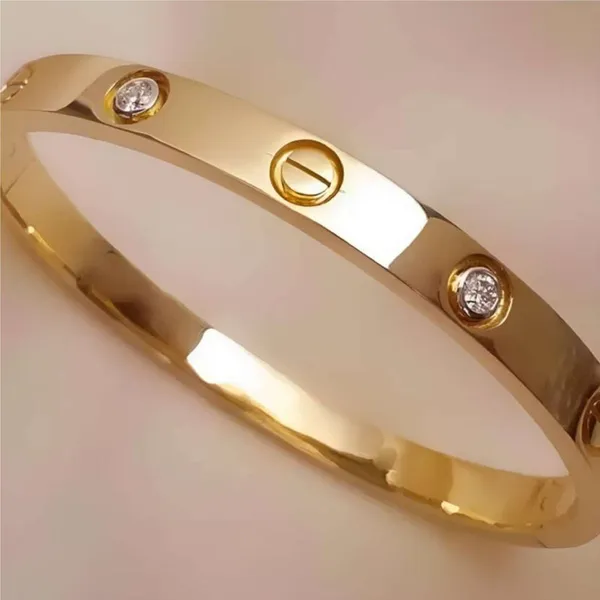 Gold_Tone_Screw_Motif_Bangle_for_Women