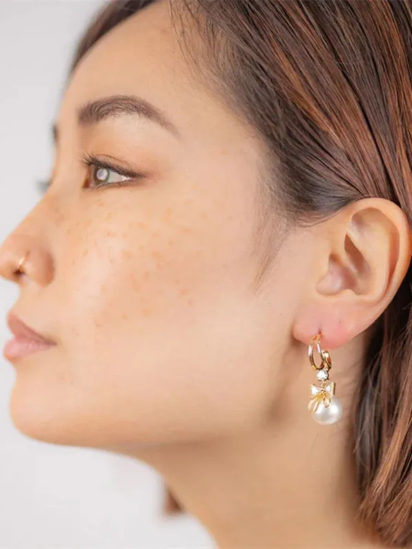 Premium_Korean-Style_Pearl_&_Crystal_Earrings_Combo_–_Elegant_Bow,_Heart_&_Leaf_Designs_for_Women