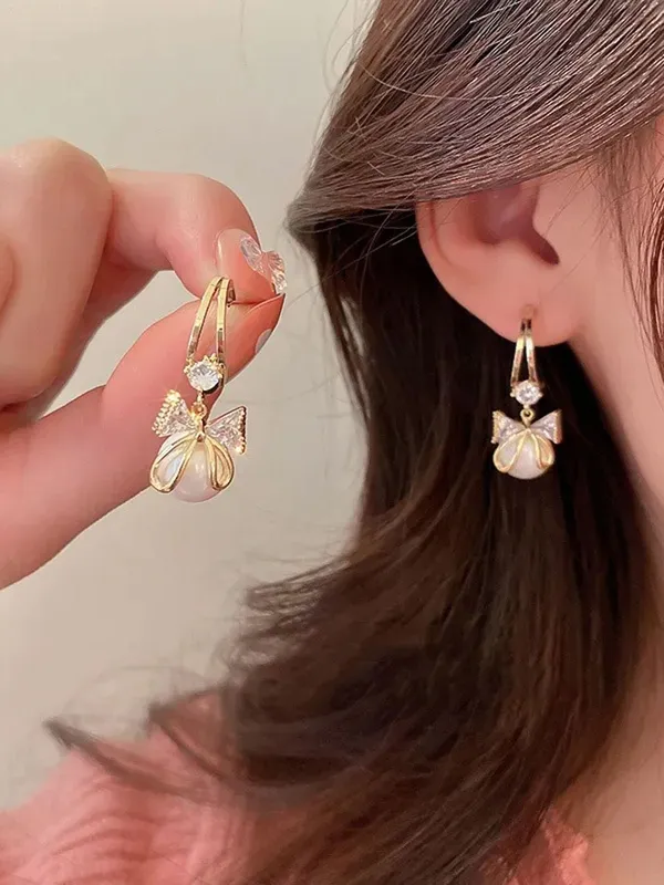 Premium_Korean-Style_Pearl_&_Crystal_Earrings_Combo_–_Elegant_Bow,_Heart_&_Leaf_Designs_for_Women