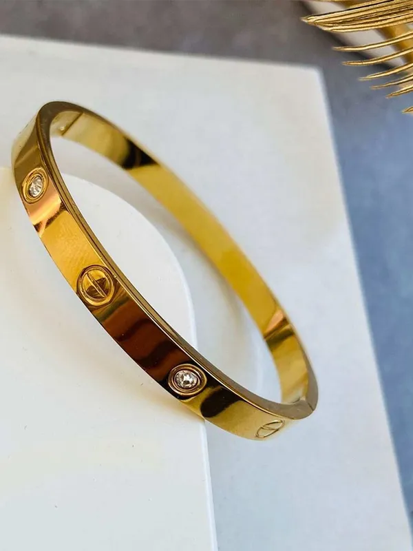 Gold_Tone_Screw_Motif_Bangle_for_Women