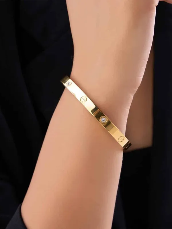 Gold_Tone_Screw_Motif_Bangle_for_Women