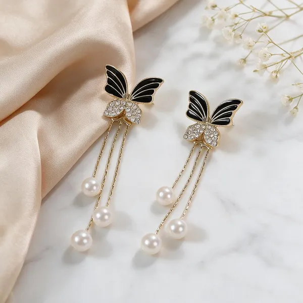 Premium_Butterfly_Earrings_Combo_–_Black_Pearl,_Ivory_Bow_&_Purple_Crystal_Butterfly_Drop_Earrings_|_3_Pair_Combo