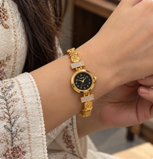 Luxury_Gold-Tone_Women's_Bracelet_Watch_with_Black_Dial_&_Elegant_Crystal-Style_Link_Design