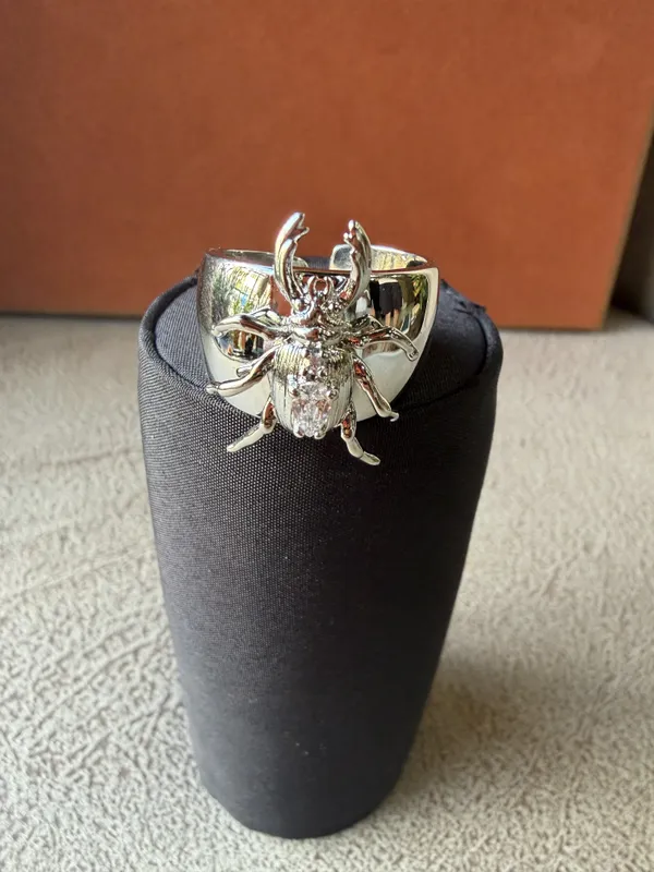 Silver_Stainless_Steel_Beetle_Motif_Statement_Ring_For_Women