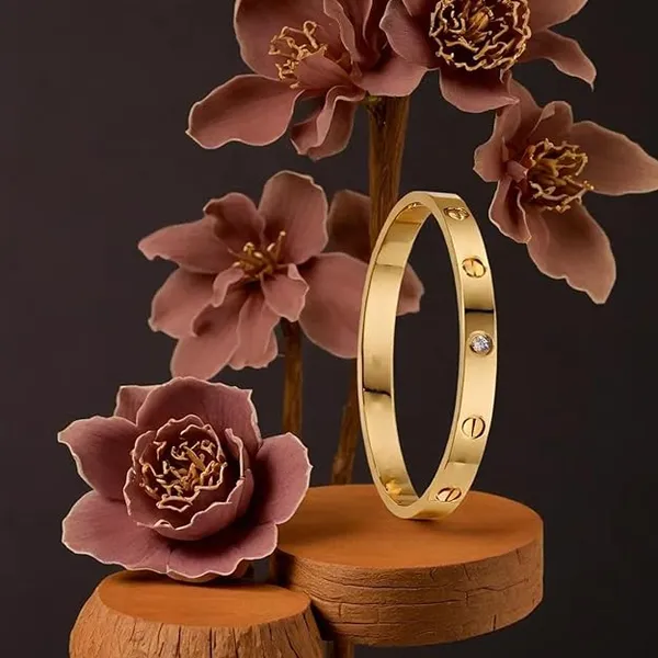 Gold_Tone_Screw_Motif_Bangle_For_Women