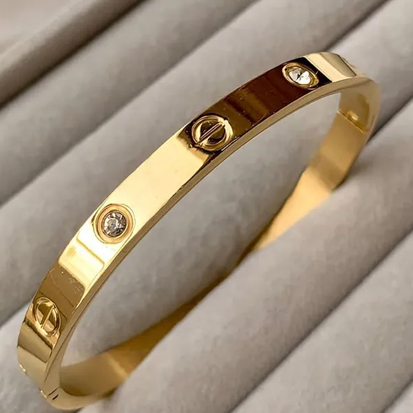 Gold_Tone_Screw_Motif_Bangle_For_Women