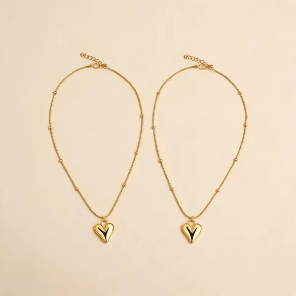 Golden_Stainless_Steel_Drop_Heart_Pendant_Locket_For_Unisex_-_Pack_of_2
