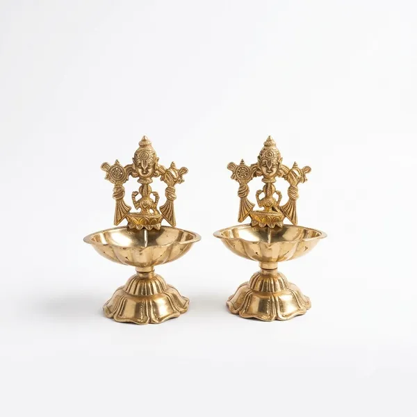 Brass_Traditional_Lakshmi_Design_Diya_Lamp_(Pack_of_2)