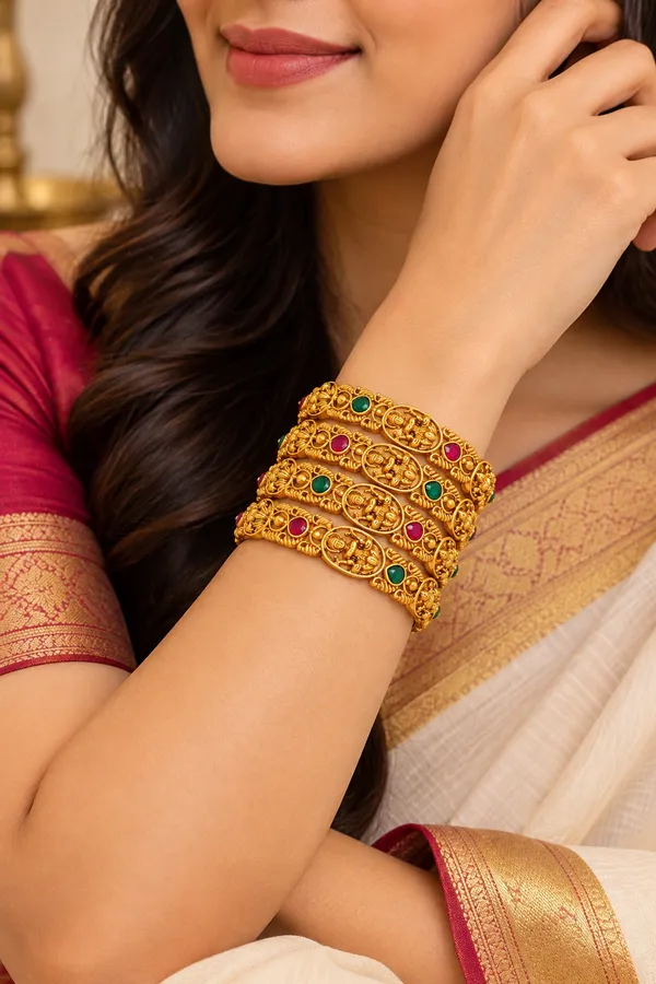 Traditional_Gold-Plated_Temple_Jewellery_Bangles_for_Women_|_Antique_Finish_Lakshmi_Design_Kada_Set_with_Red_&_Green_Stone_Embellishments_|_Festive_Wear