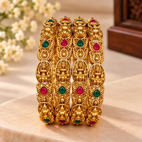 Traditional_Gold-Plated_Temple_Jewellery_Bangles_for_Women_|_Antique_Finish_Lakshmi_Design_Kada_Set_with_Red_&_Green_Stone_Embellishments_|_Festive_Wear