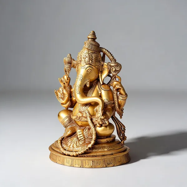 Brass_Sitting_Ganesha_Idol__Gold_Finish