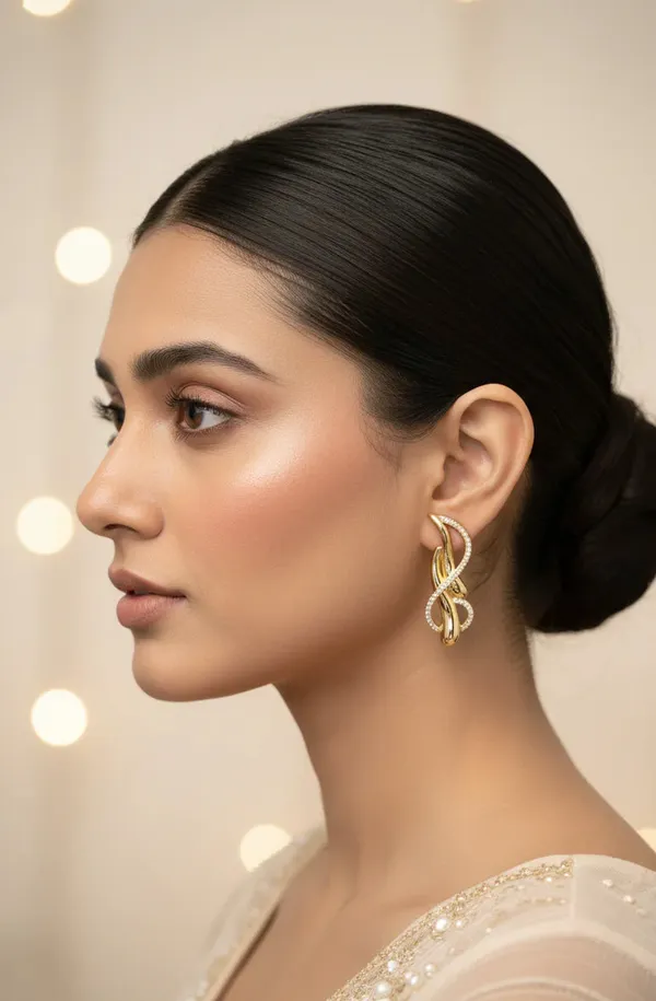 Eternal_Flow_Earrings_Sculpted_Gold_Tone_Statement_Jewellery