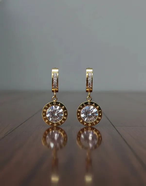 Prexela_Round_Crystal_Drop_Huggie_Earrings_18k_Gold_Tone_Finish