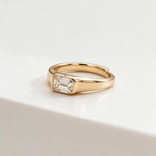 Bezel_Set_Emerlald_Cut_Moissanite_Diamond_Ring_Gold