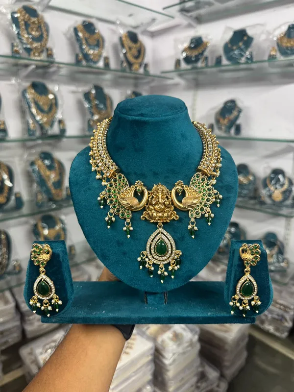 Green_Heavy_Brass_Peacock_Temple_Necklace_Set_For_Women