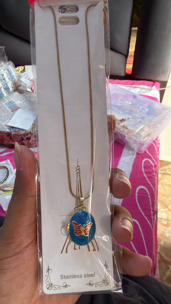 Blue_Stainless_Steel_Butterfly_Pendant_Neck_Chain_For_Women