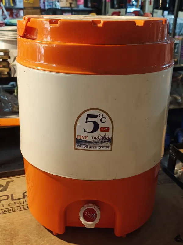 Plastic_Orange_Cylindrical_Water_Cooler_Dispenser_With_Tap