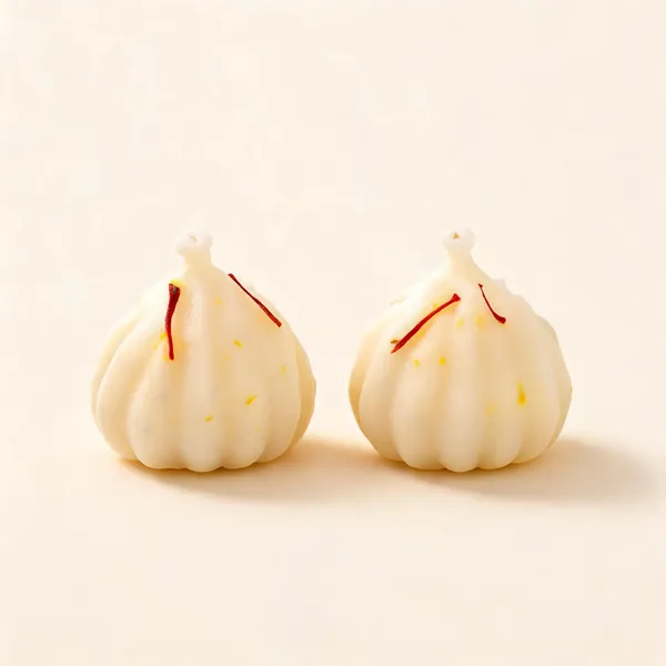 Soy_Wax_Kesar_Sandalwood_Modak_Candles_-_Pack_of_2