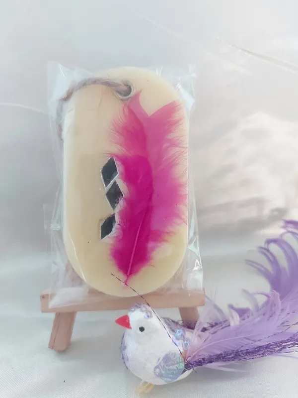 White_And_Purple_Feather_Bird_Figurine