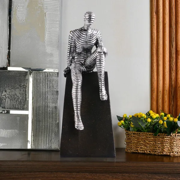 Metallic_Abstract_Striped_Seated_Human_Figurine