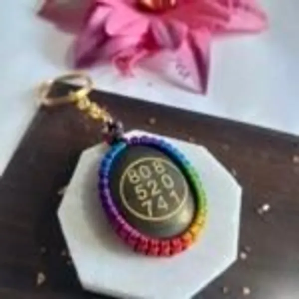 Natural_Pyrite_Zibu_Symbol_Oval_Keychain