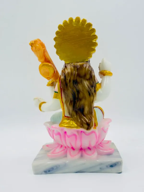 Goddess_Saraswati_Idol_With_Veena_Sitting_On_Lotus_Marble_Dust_Figurine_White_With_Gold_Accents_Traditional_Hindu_Style_Marble_Base_18cm_Height