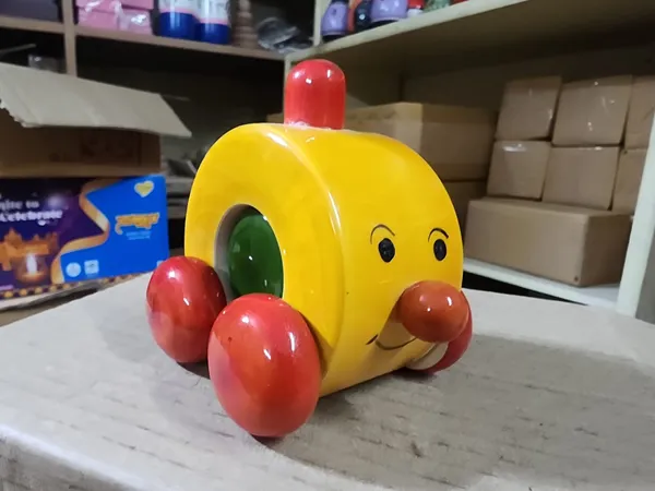 Yellow_Wood_Cartoon_Face_Push_Along_Toy_Car_For_Kids