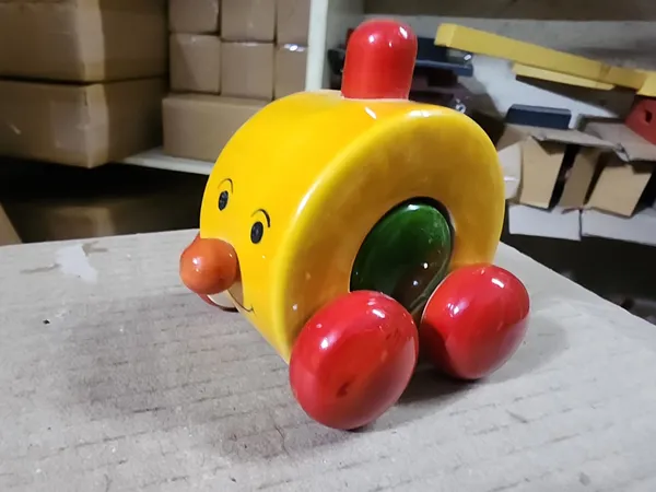 Yellow_Wood_Cartoon_Face_Push_Along_Toy_Car_For_Kids