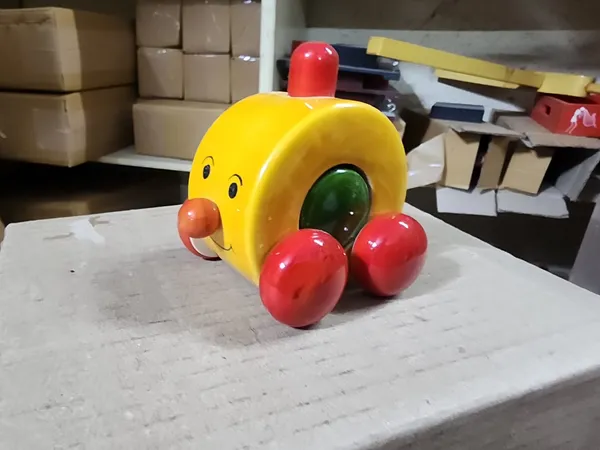 Yellow_Wood_Cartoon_Face_Push_Along_Toy_Car_For_Kids