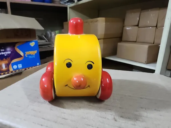 Yellow_Wood_Cartoon_Face_Push_Along_Toy_Car_For_Kids