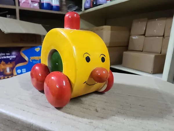 Yellow_Wood_Cartoon_Face_Push_Along_Toy_Car_For_Kids