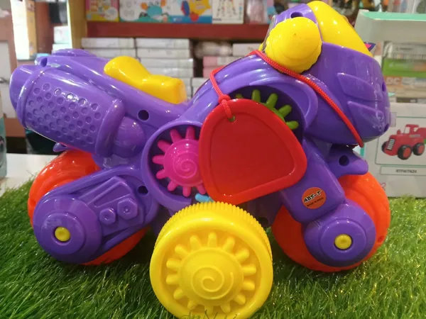Purple_Dinosaur_Wheeled_Toy_Vehicle