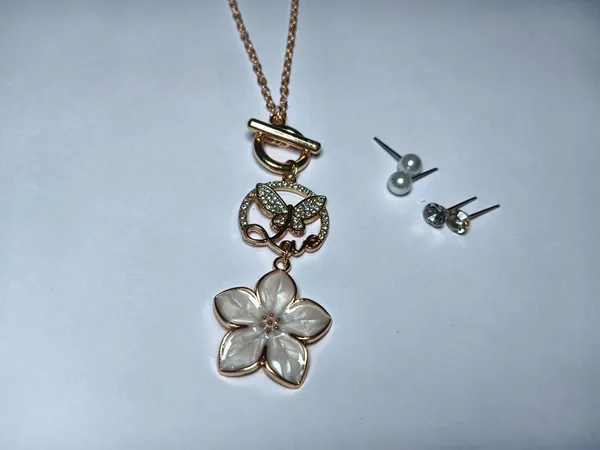 Gold_Brass_Combo_Earring_And_Pendant_Set_For_Women