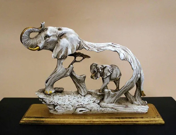 Resin_Elephant_Showpiece_On_Wooden_Base
