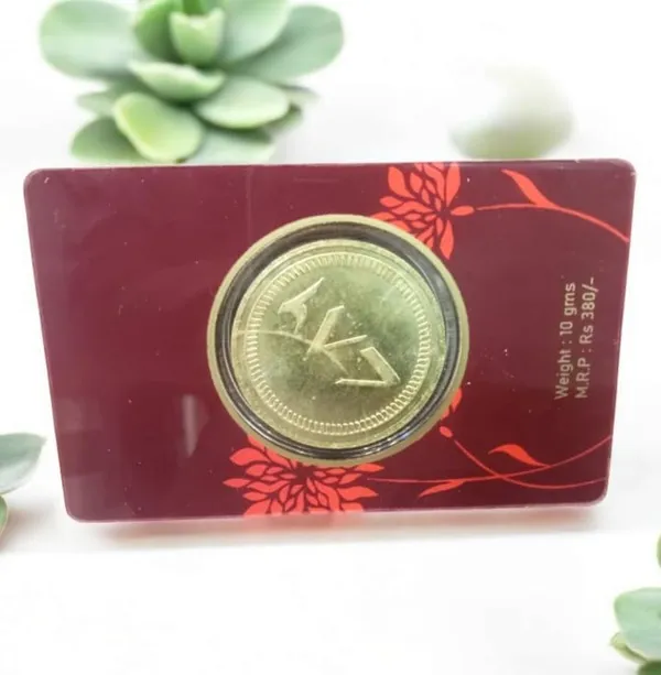 Brass_Decorative_Coin_With_Plant_Background