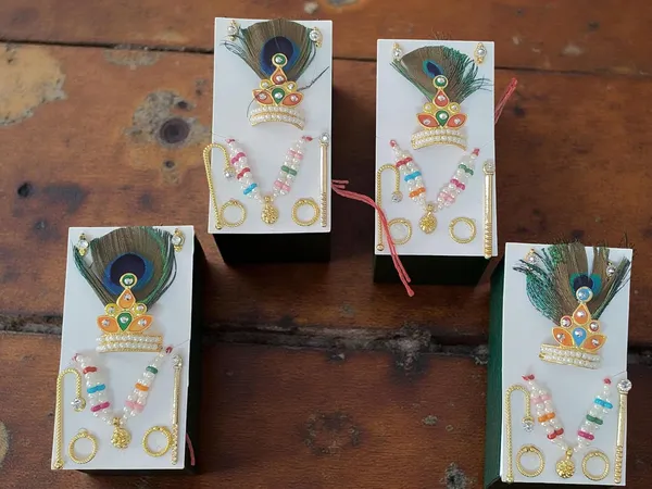 A_S_Ventures_Pack_Of_4_Set_Laddu_Gopal_Ji_Mukut_Mala_Shringar_Set_With_Bansuri_Kundal_Karula_Chhari_Size_0_1_2_Multicolor_Combo_Jewellery_Set_For_Bal_Gopal_6_Items_Inclued