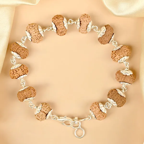 16_Mukhi_Rudraksha_925_Silver_Flower_Caps_Bracelet