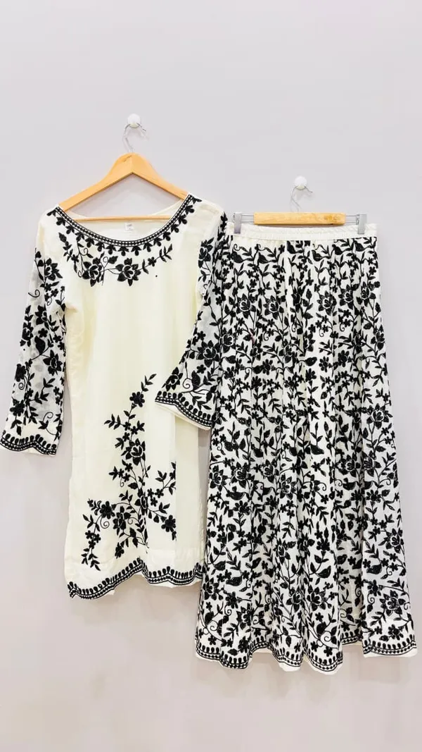 Ivory_And_Black_Premium_Rayon_Kurti_With_Pant_And_Dupatta_Set_For_Women