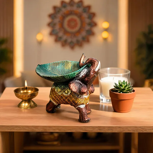Resin_Brown_Lucky_Elephant_Idol_With_Green_Leaf_Urli_Showpiece