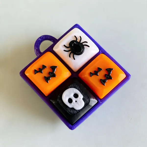 Purple_&_Orange_Pla_Halloween_Fidget_Clicker_Keychain