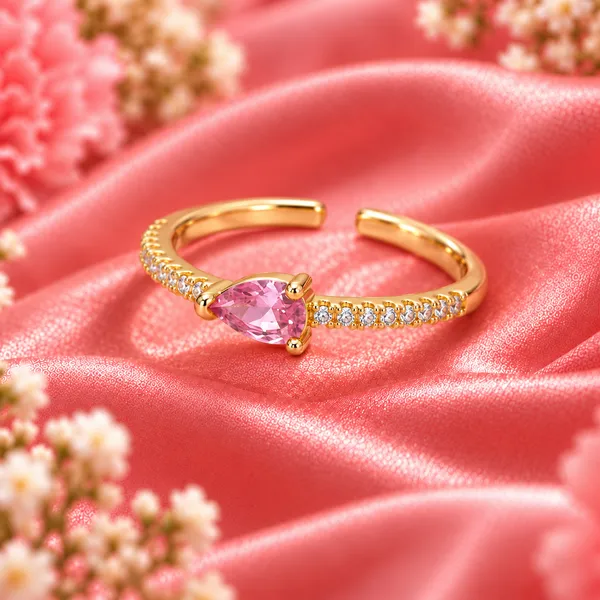 Pink_Pear-Cut_East-West_Pavé_Ring_–_Gold_Tone