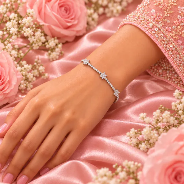 Elegant_Silver-Tone_Crystal_and_Floral_Motif_Tennis_Bracelet