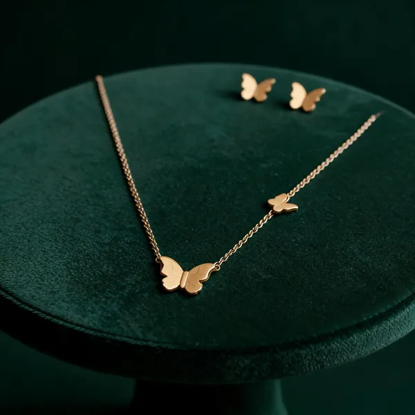 Golden_Alloy_Butterfly_Motif_Necklace_And_Earrings_Set_For_Women