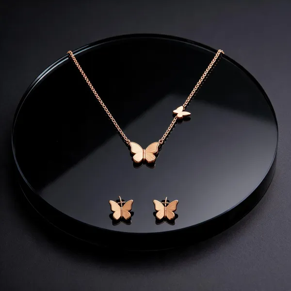 Golden_Alloy_Butterfly_Motif_Necklace_And_Earrings_Set_For_Women