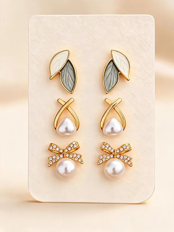 Golden_Alloy_Pearl_Leaf_And_Bow_Stud_Earrings_Set_For_Women