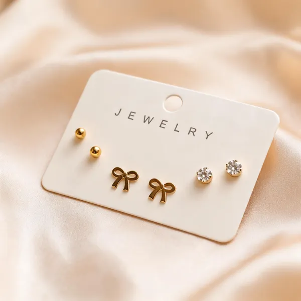 Golden_Alloy_Stud_And_Bow_Earrings_Set_For_Women